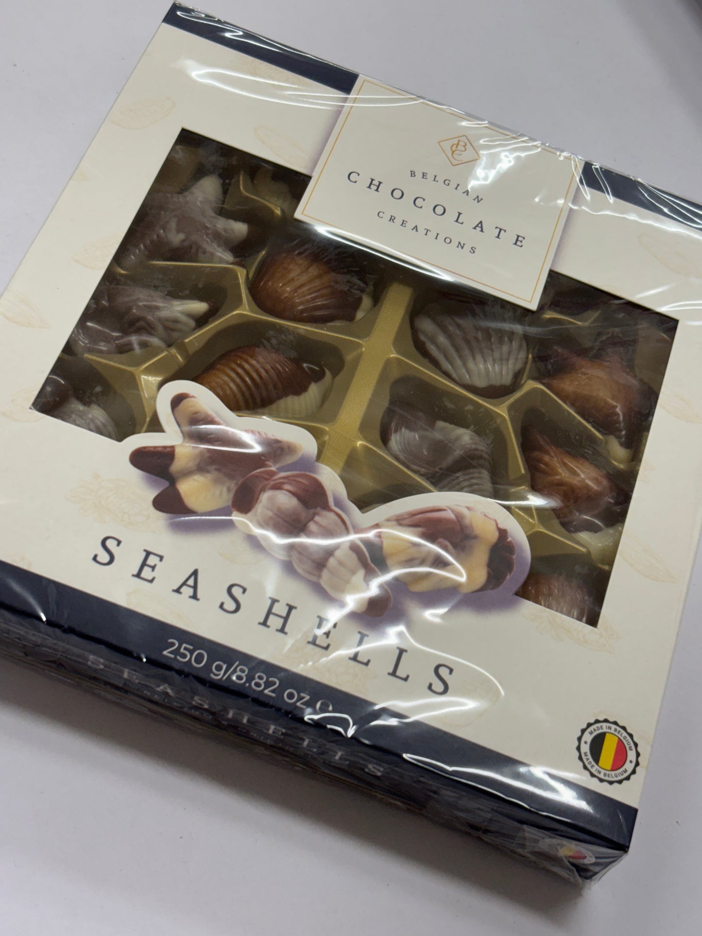 Select Sweets Belgian chocolate seashells in a stylish packaging for gift giving or personal indulgence