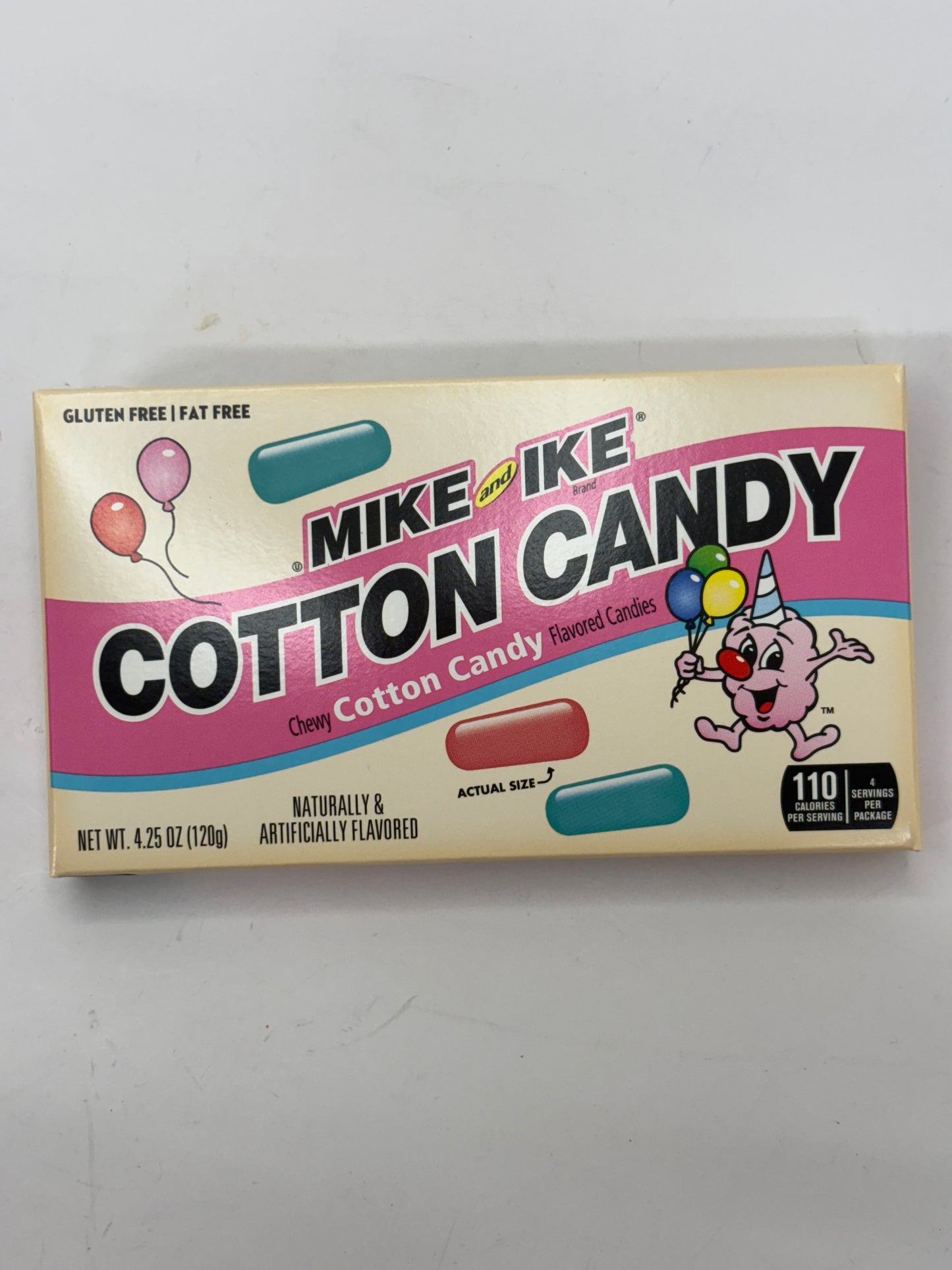 Mike and Ike cotton candy flavor candy box with colorful design and cartoon character holding balloons