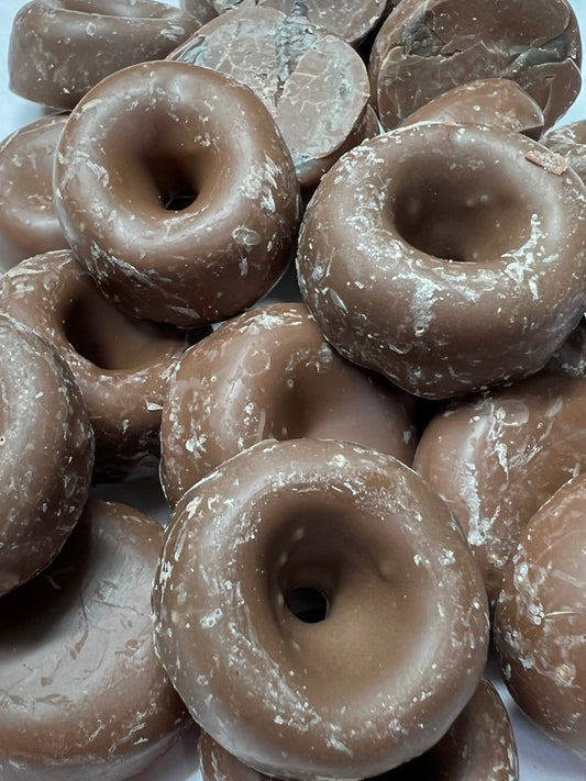 SelectSweets milk chocolate aniseed rings with smooth coating and distinctive ring shape stack