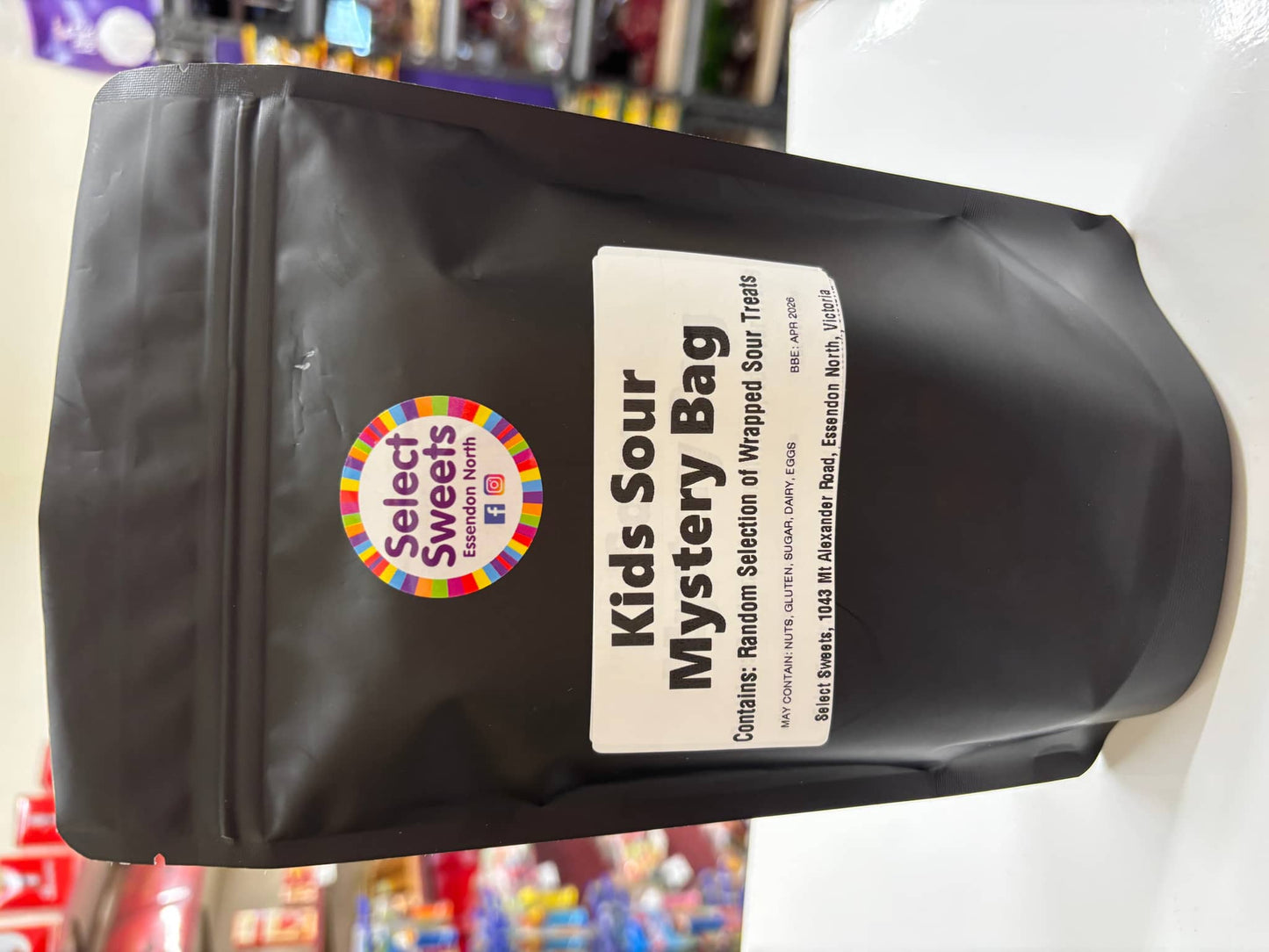 Select Sweets Kids Sour Candy Mystery Bag with a variety of wrapped sour treats