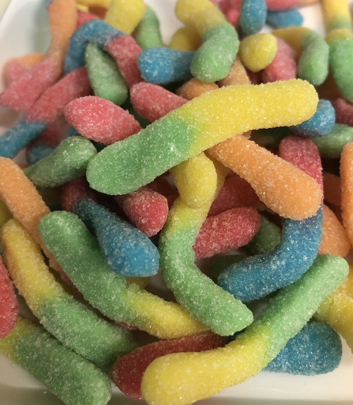 SelectSweets colorful sour gummy worms coated with sugar in assorted flavors