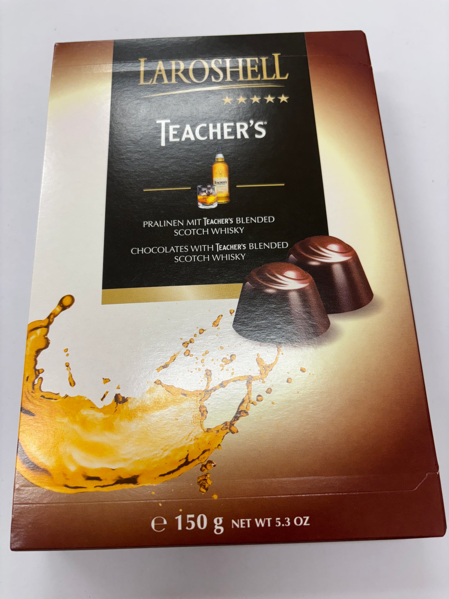 Laroshell Teacher's whiskey filled chocolates box featuring pralines with Teacher's blended scotch whisky
