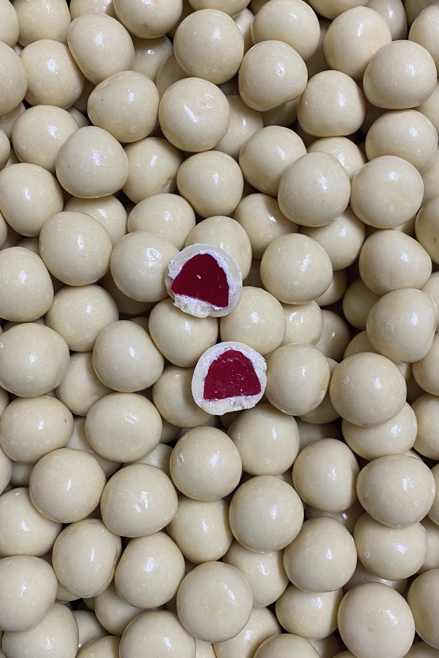 SelectSweets white chocolate coated raspberries with a rich red raspberry center inside smooth white chocolate