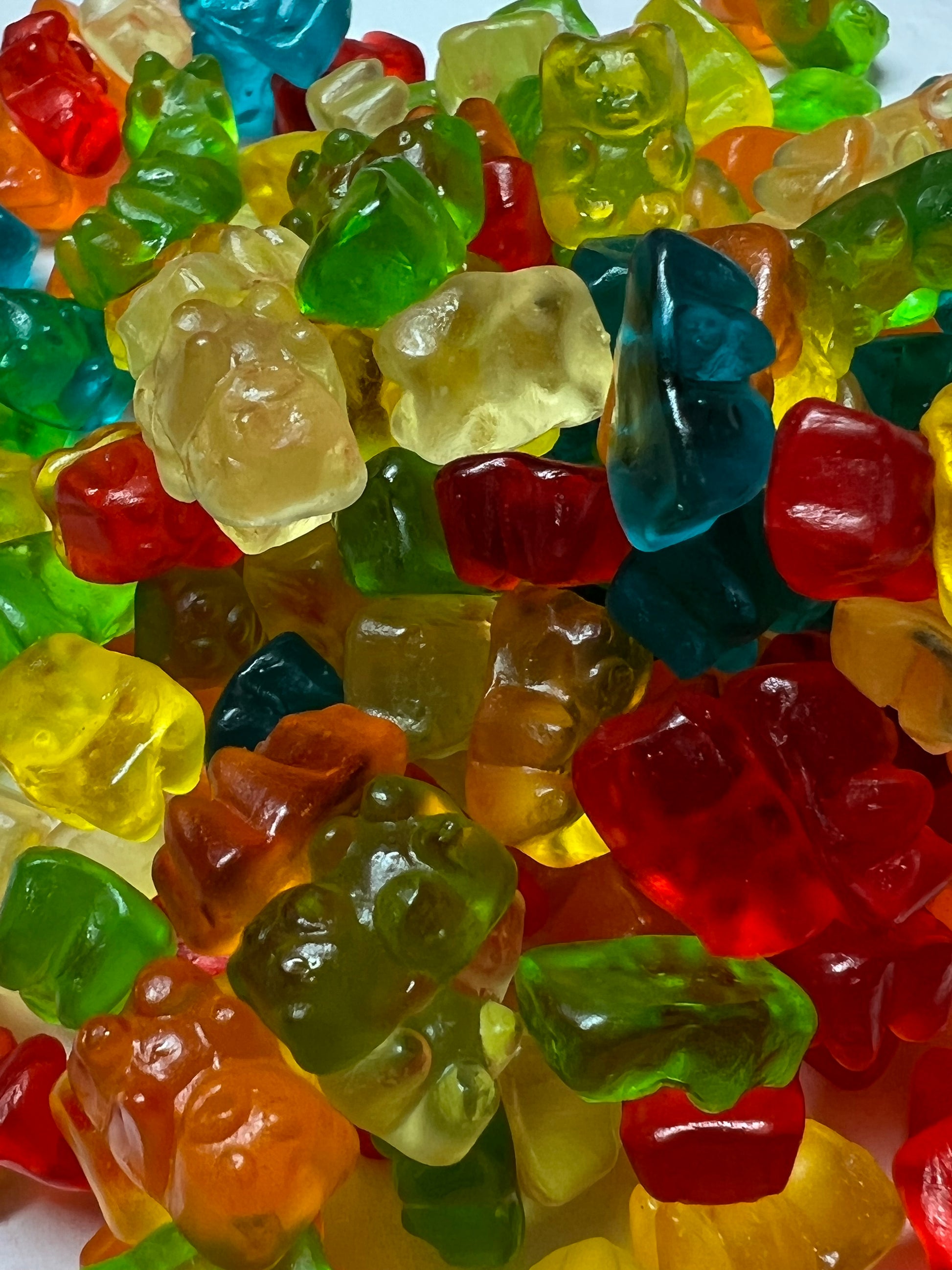 SelectSweets assorted fruit gummy candy in various colors and bear shapes close-up