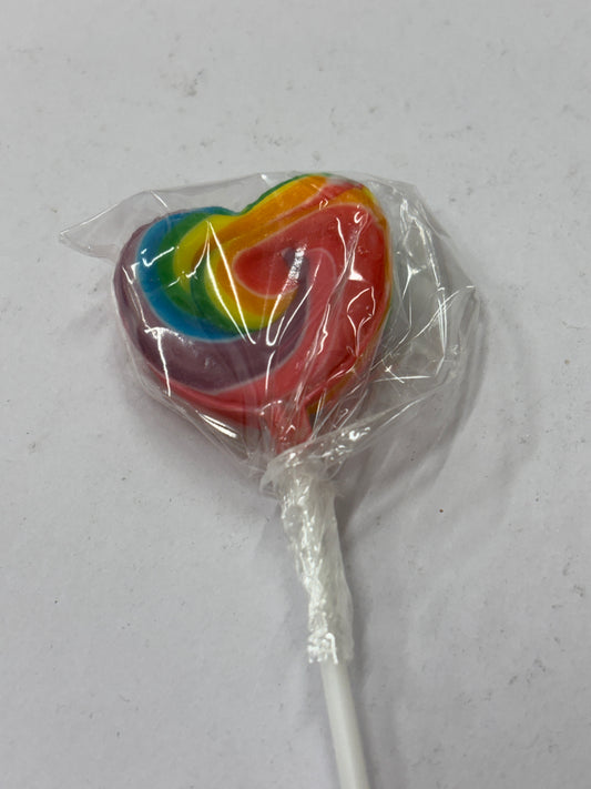 Rainbow heart lollipop wrapped in clear plastic, vibrant colors swirling in a heart shape