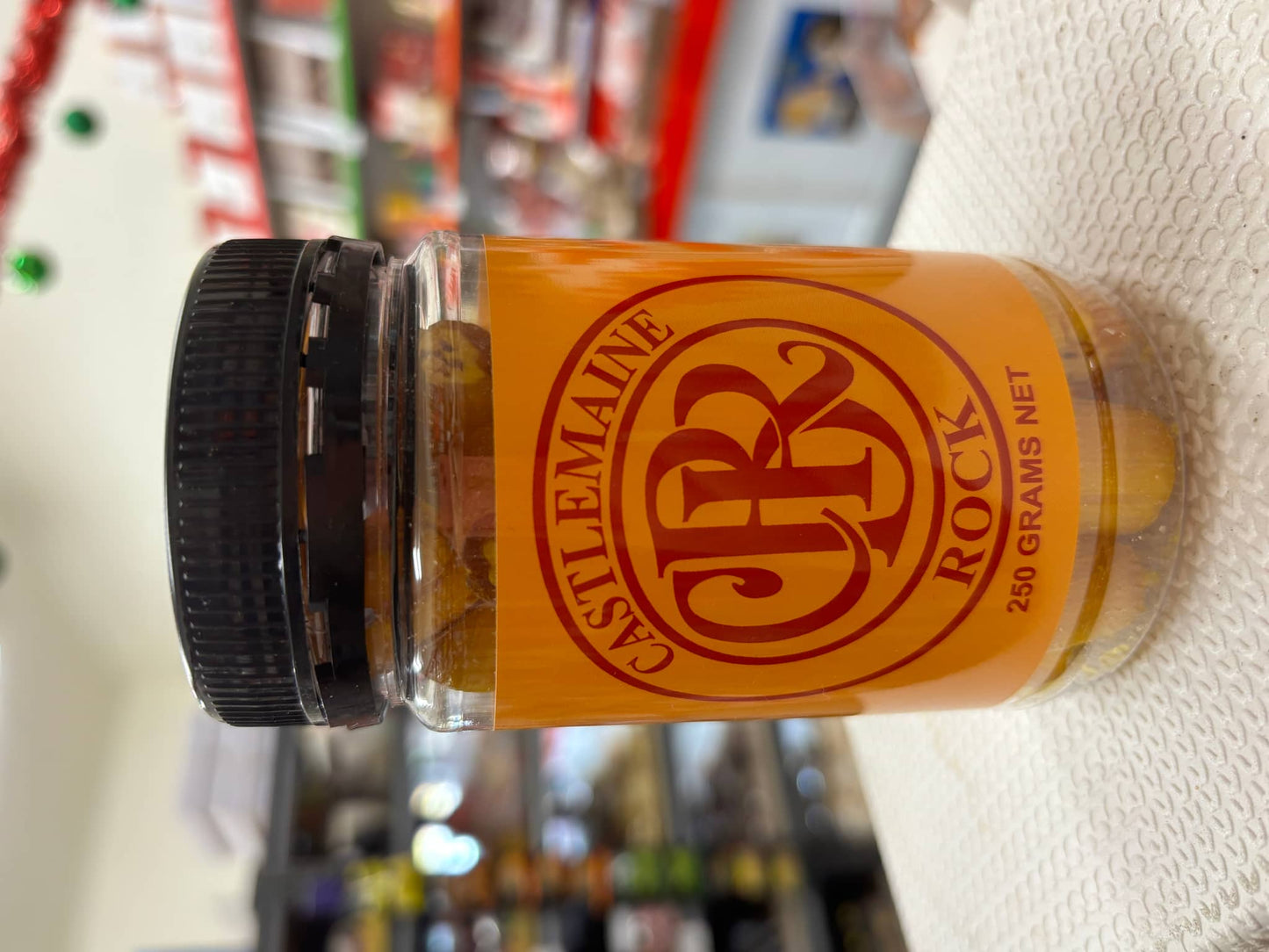 Jar of Castlemain Rock candy from Select Sweets, containing 250 grams of colorful rock candy treats