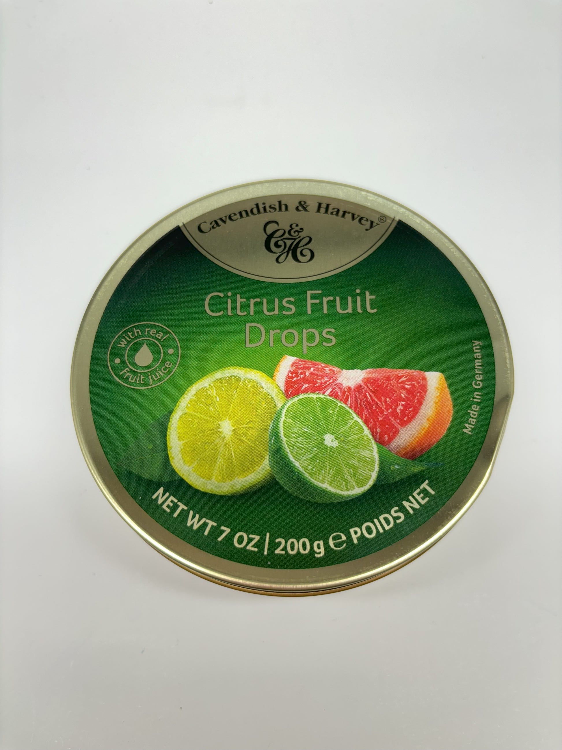 Select Sweets Citrus Fruit Candy Drops tin with lemon lime and grapefruit imagery on green background