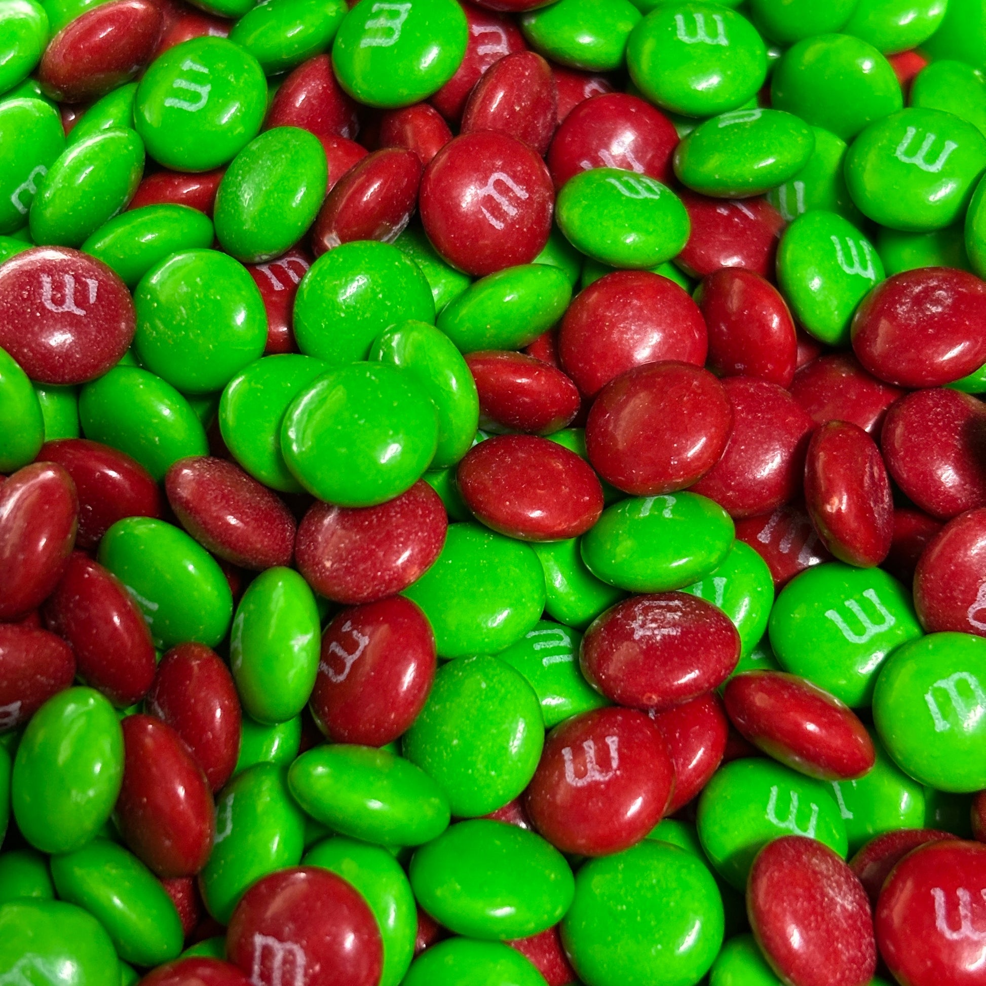 Colorful mix of Christmas M&Ms red and green perfect for festive treats and holiday celebrations