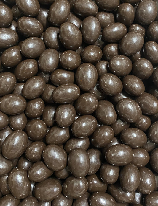 SelectSweets dark chocolate almonds with smooth glossy coating in close-up view