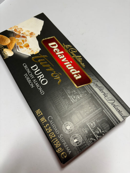 Delaviuda crunchy almond turron packaging with a delicious dessert description and elegant design