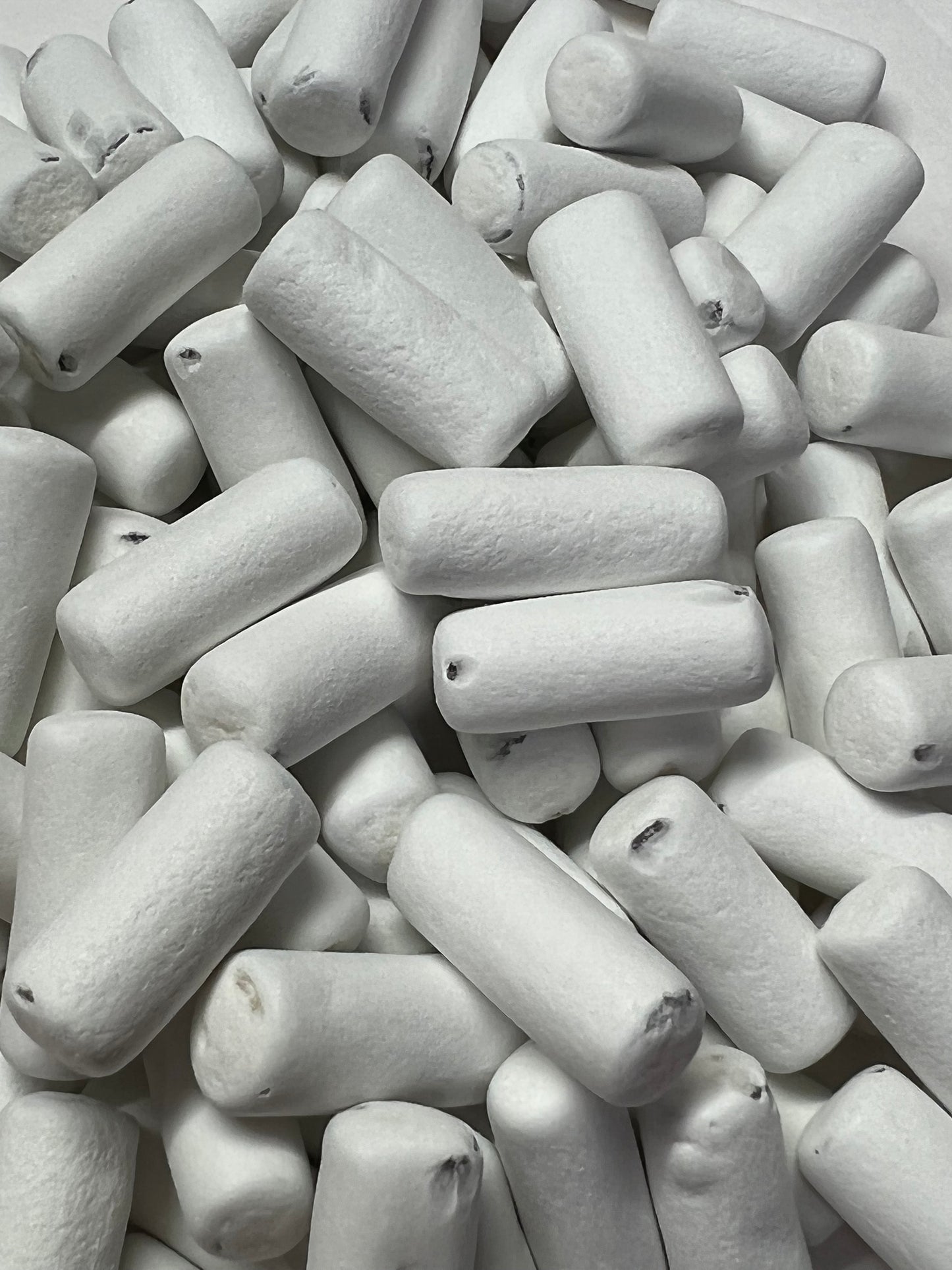 Dutch licorice school chalk candy in white, soft and chewy texture for a unique sweet treat