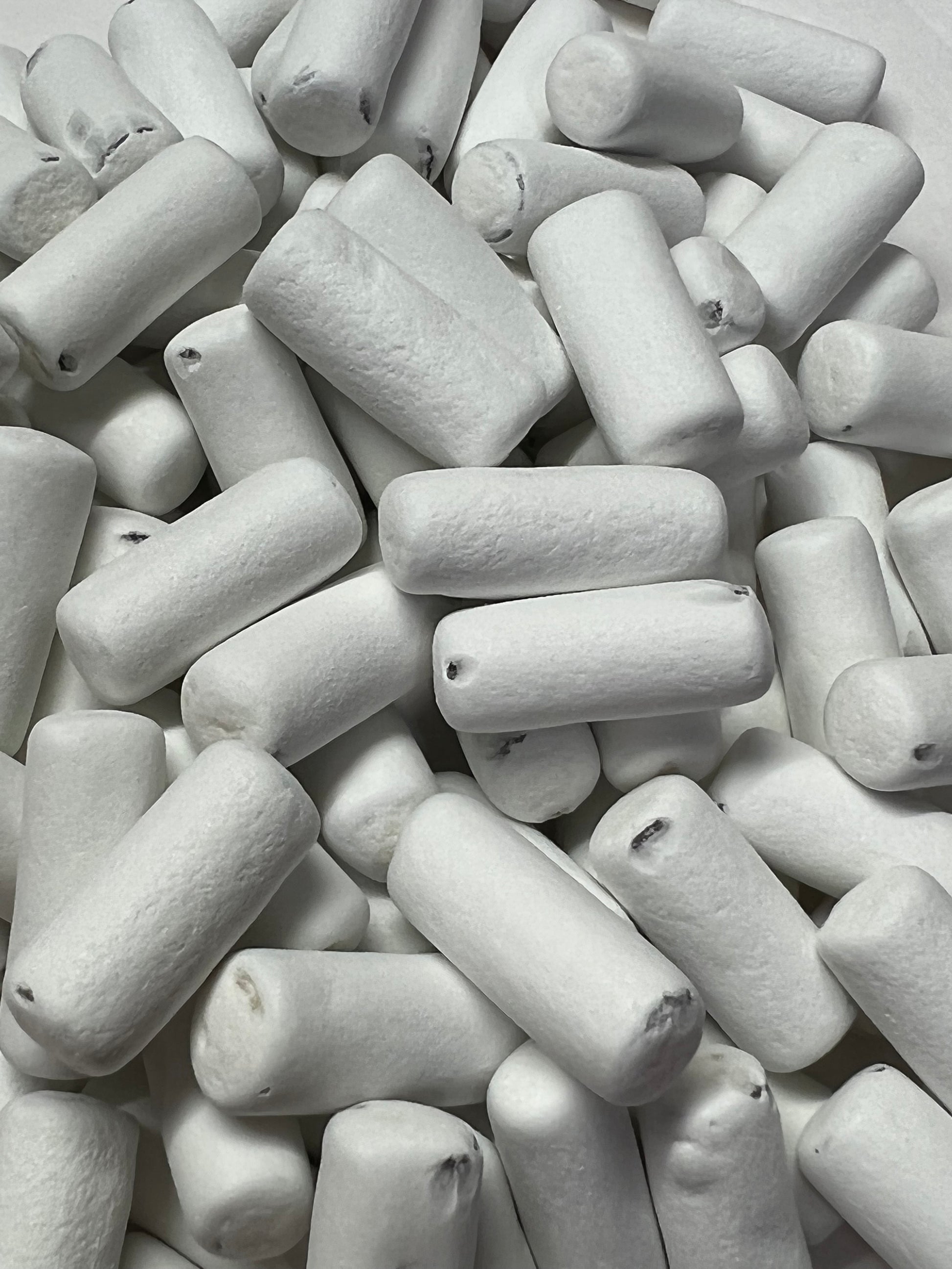 Dutch licorice school chalk candy in white, soft and chewy texture for a unique sweet treat