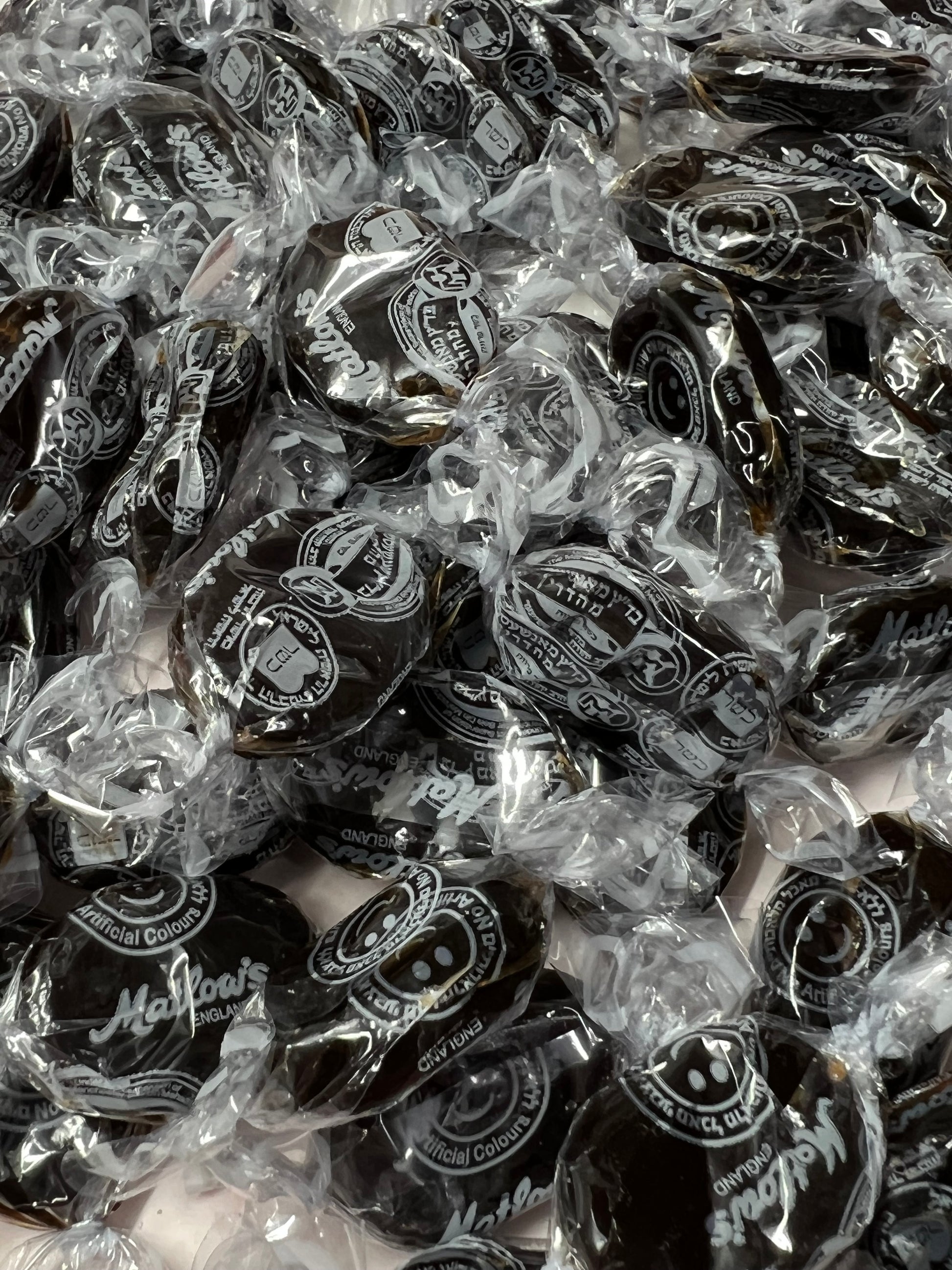 SelectSweets1 English crystal licorice candy individually wrapped in clear black and white packaging