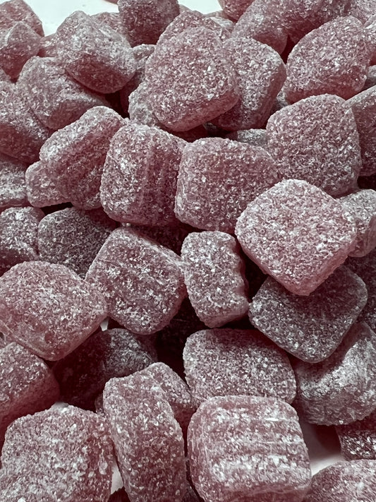 Close-up of Euco menthol jubes, chewy mint-flavored candies coated in sugar, perfect for freshening breath