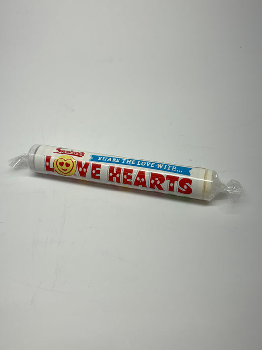 Select Sweets giant fizzers candy Love Hearts tube with red and blue packaging on white background