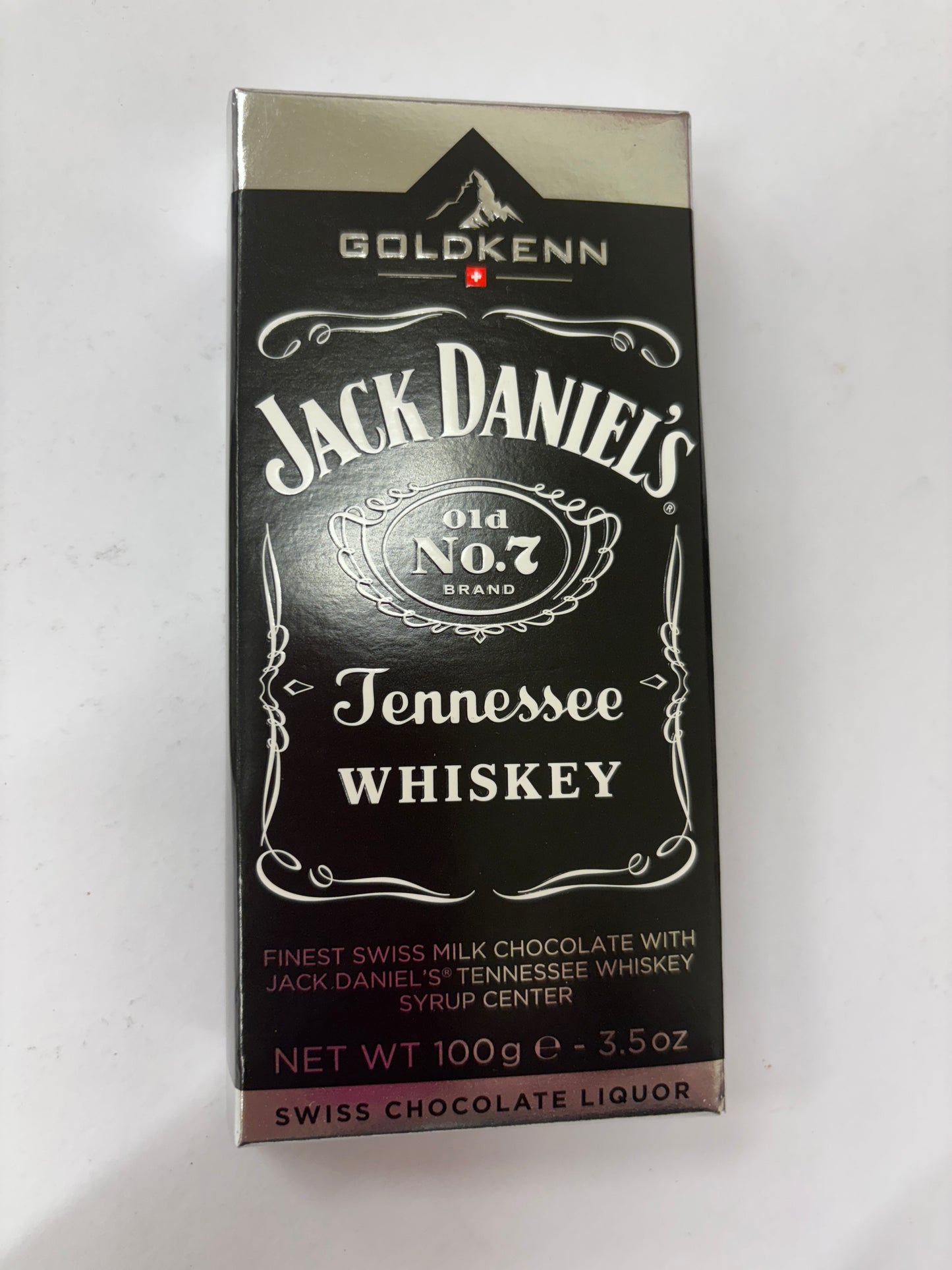 Jack Daniels chocolate block with Swiss milk chocolate and whiskey syrup center in elegant packaging