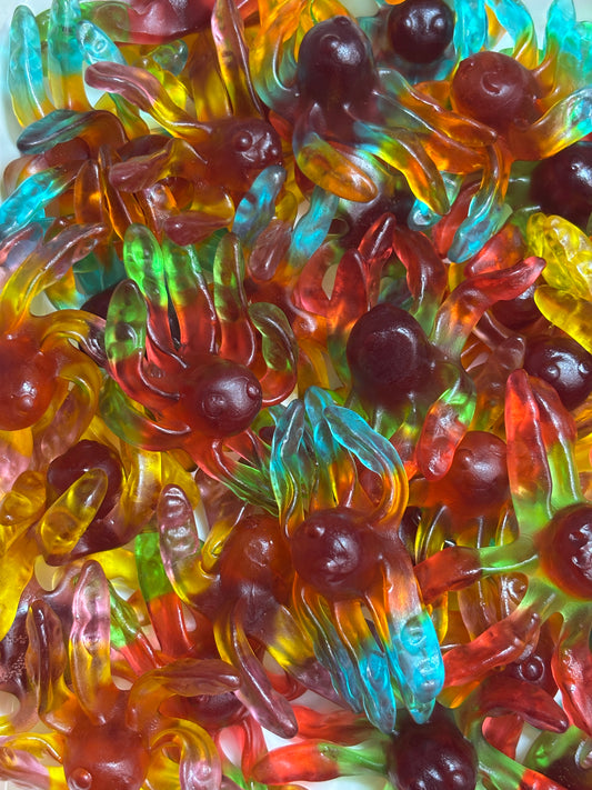 Colorful gummy candy assortment featuring vibrant sea creature shapes in various flavors