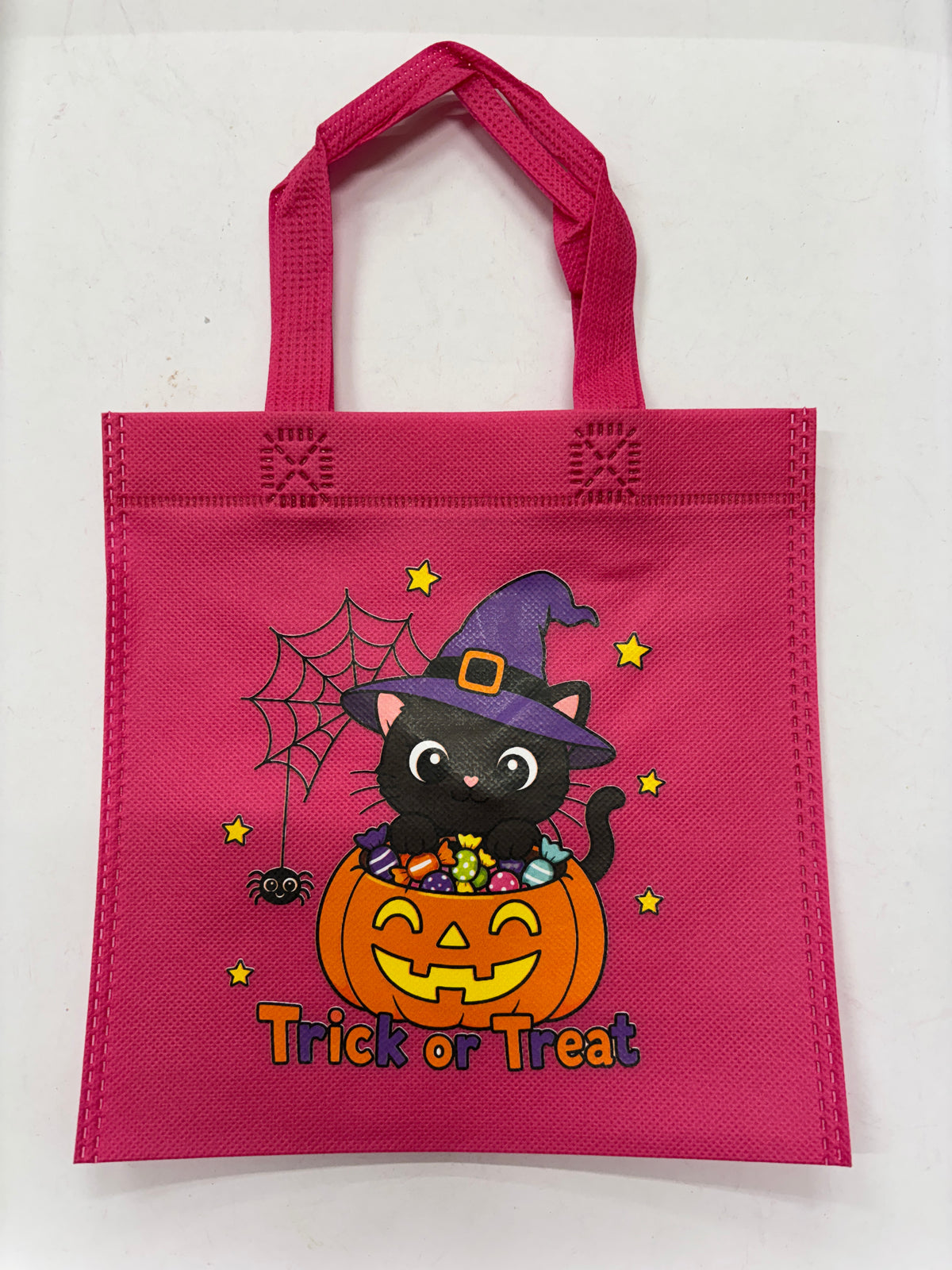 Pink Trick or Treat Halloween Tote Bag featuring a cute black cat and a pumpkin