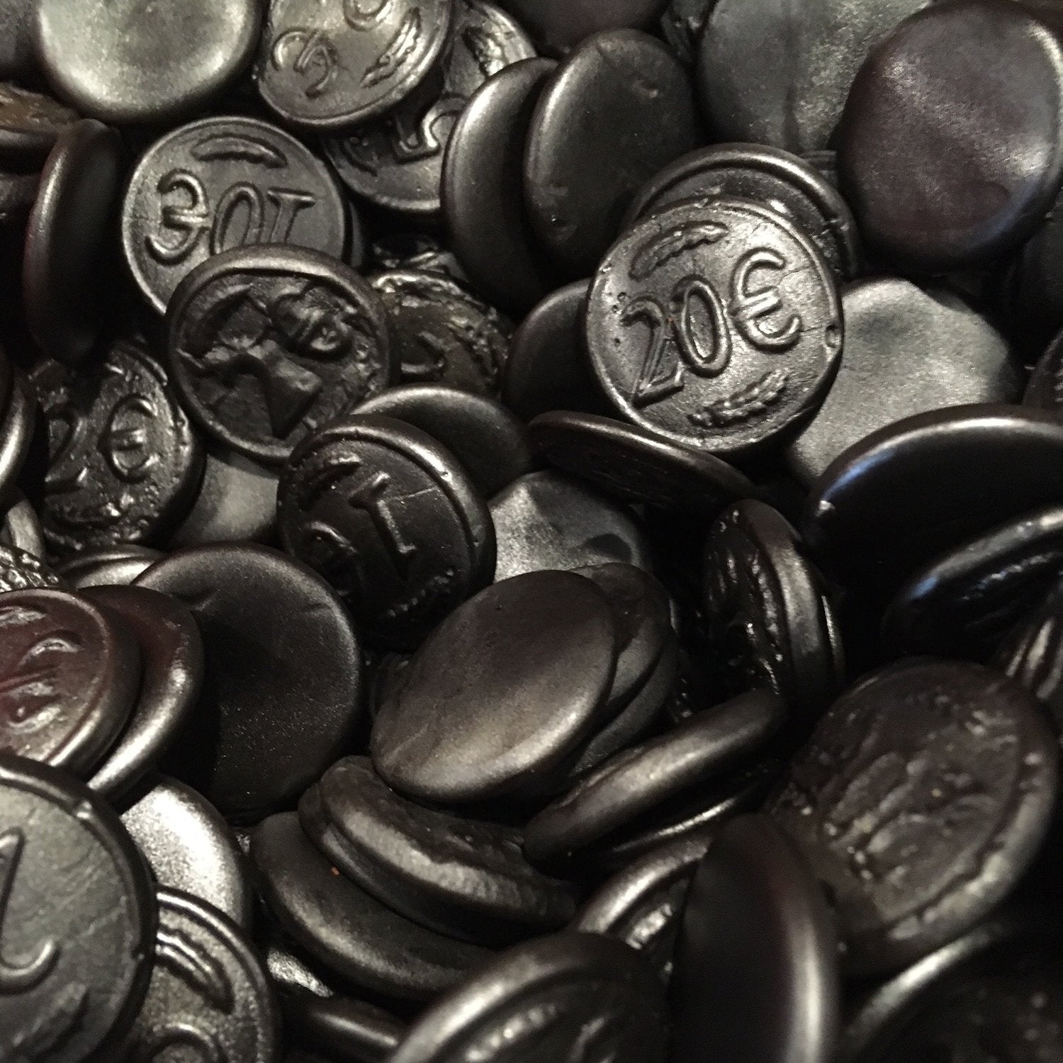 SelectSweets black licorice coin-shaped candies with embossed euro symbols and numbers