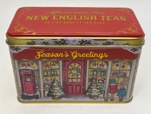 Select Sweets holiday tea gift tin with vintage holiday storefront and Season's Greetings text