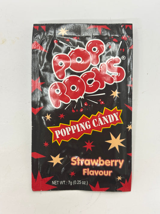 Pop Rocks Strawberry candy popping candy packet with red and black star design and 7g net weight