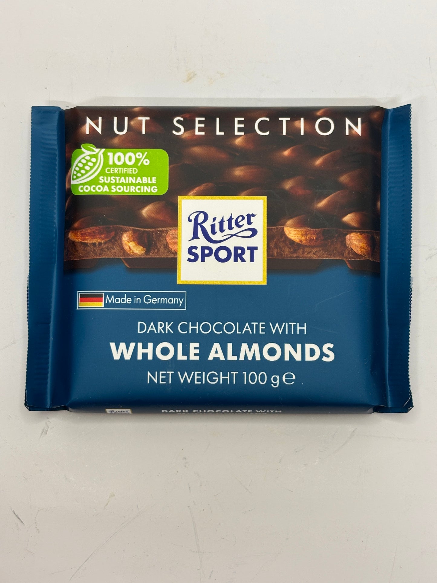 Ritter Sport dark chocolate with whole almonds in blue packaging by Select Sweets