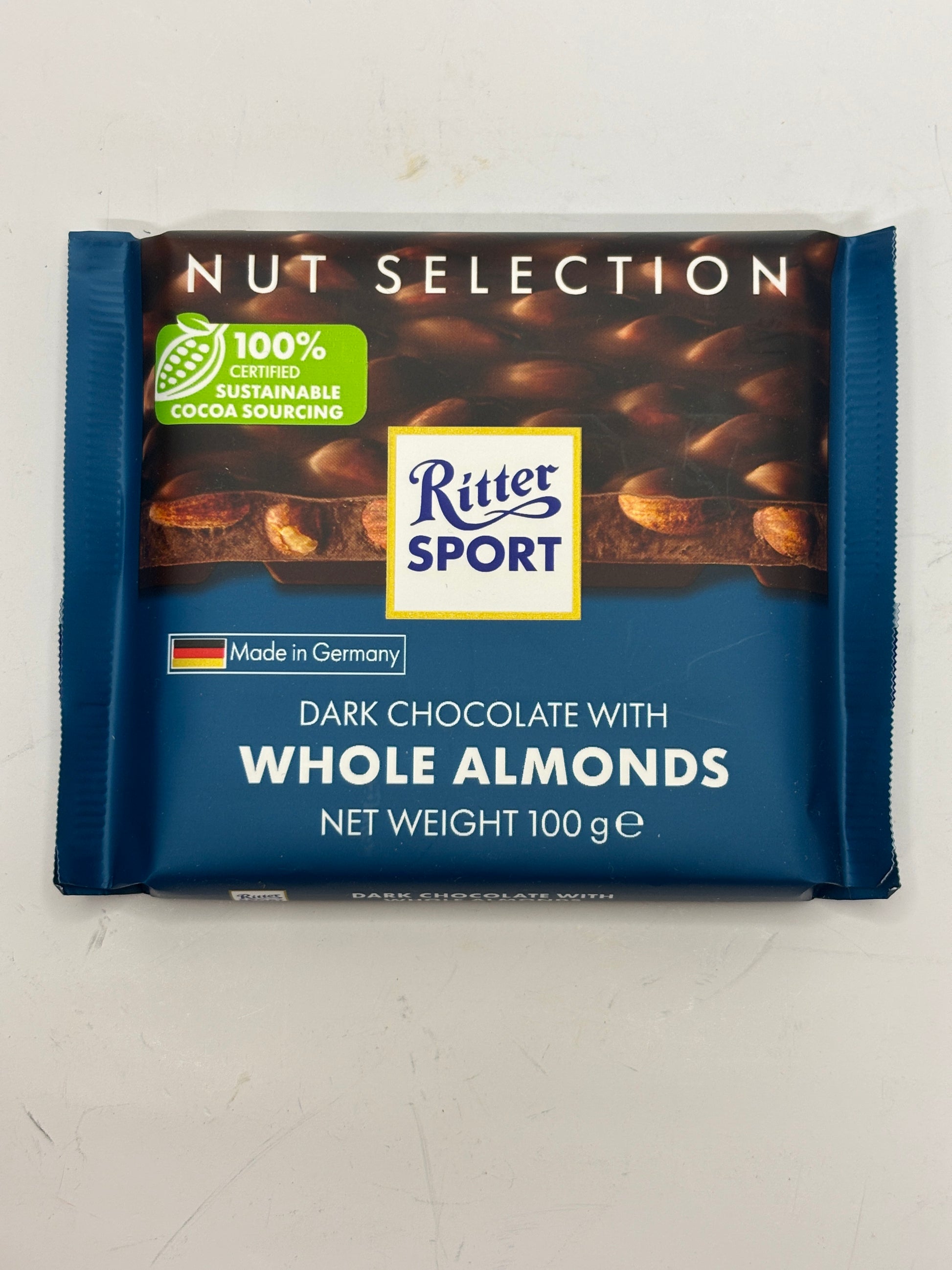 Ritter Sport dark chocolate with whole almonds in blue packaging by Select Sweets