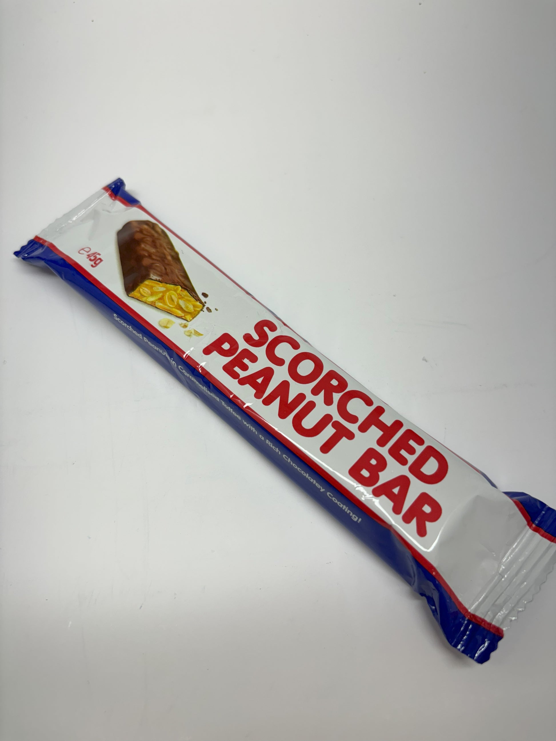 Select Sweets Scorched Peanut Bar chocolate candy bar with peanuts on white background