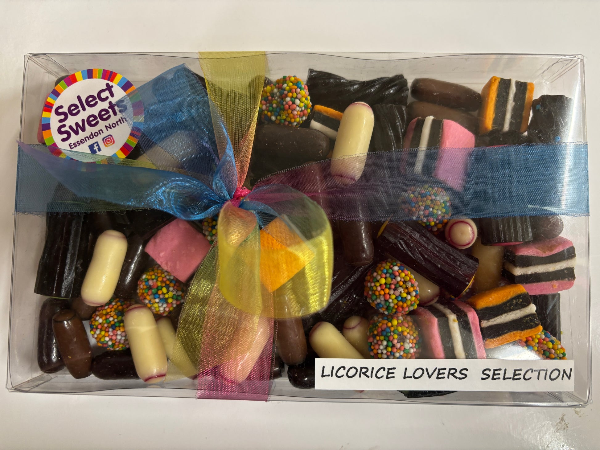 Select Sweets licorice gift box clear plastic case with multicolor ribbon and assorted licorice treats
