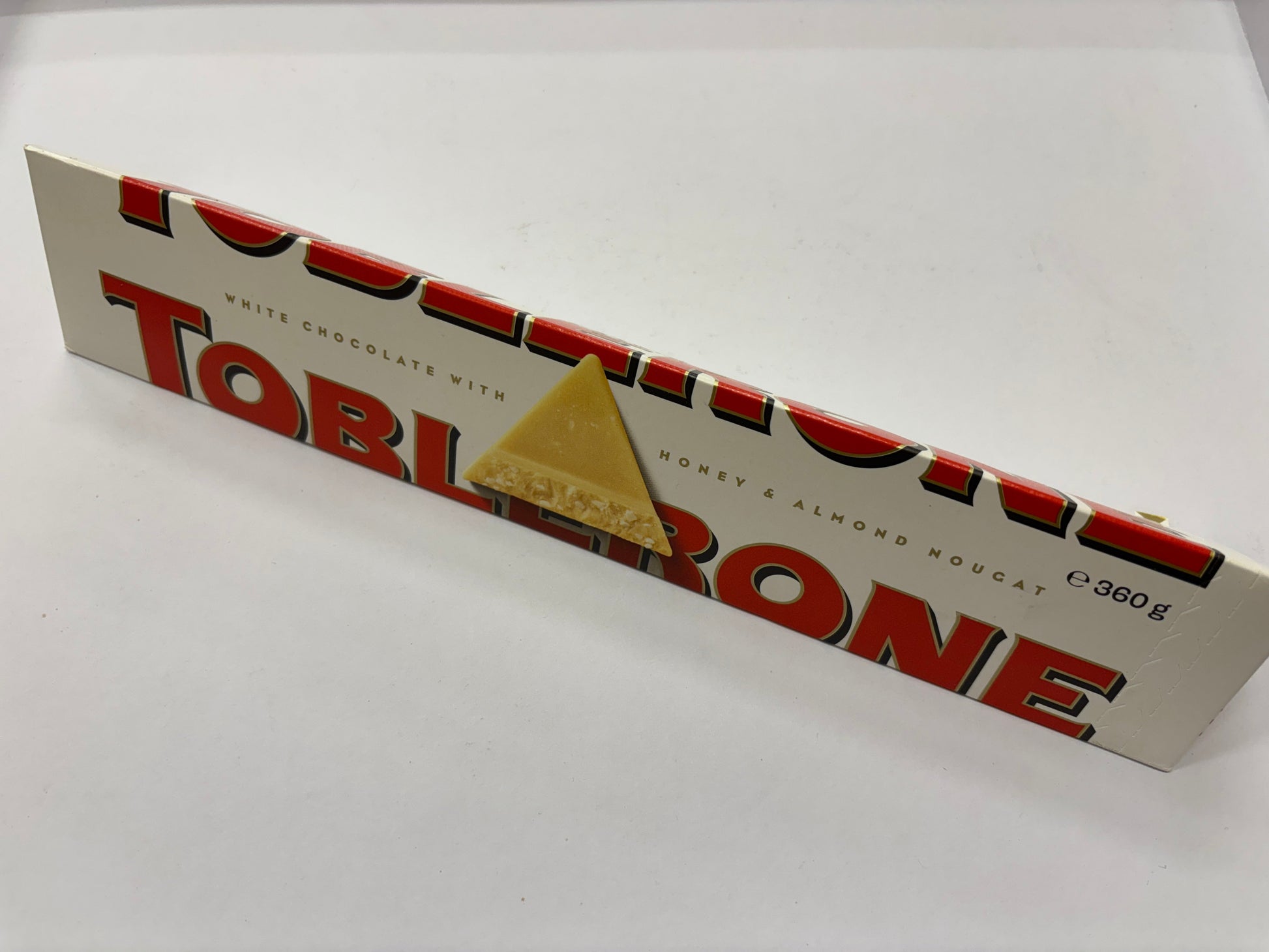 Select Sweets White Chocolate Toblerone Bar with Honey and Almond Nougat in 360g Packaging