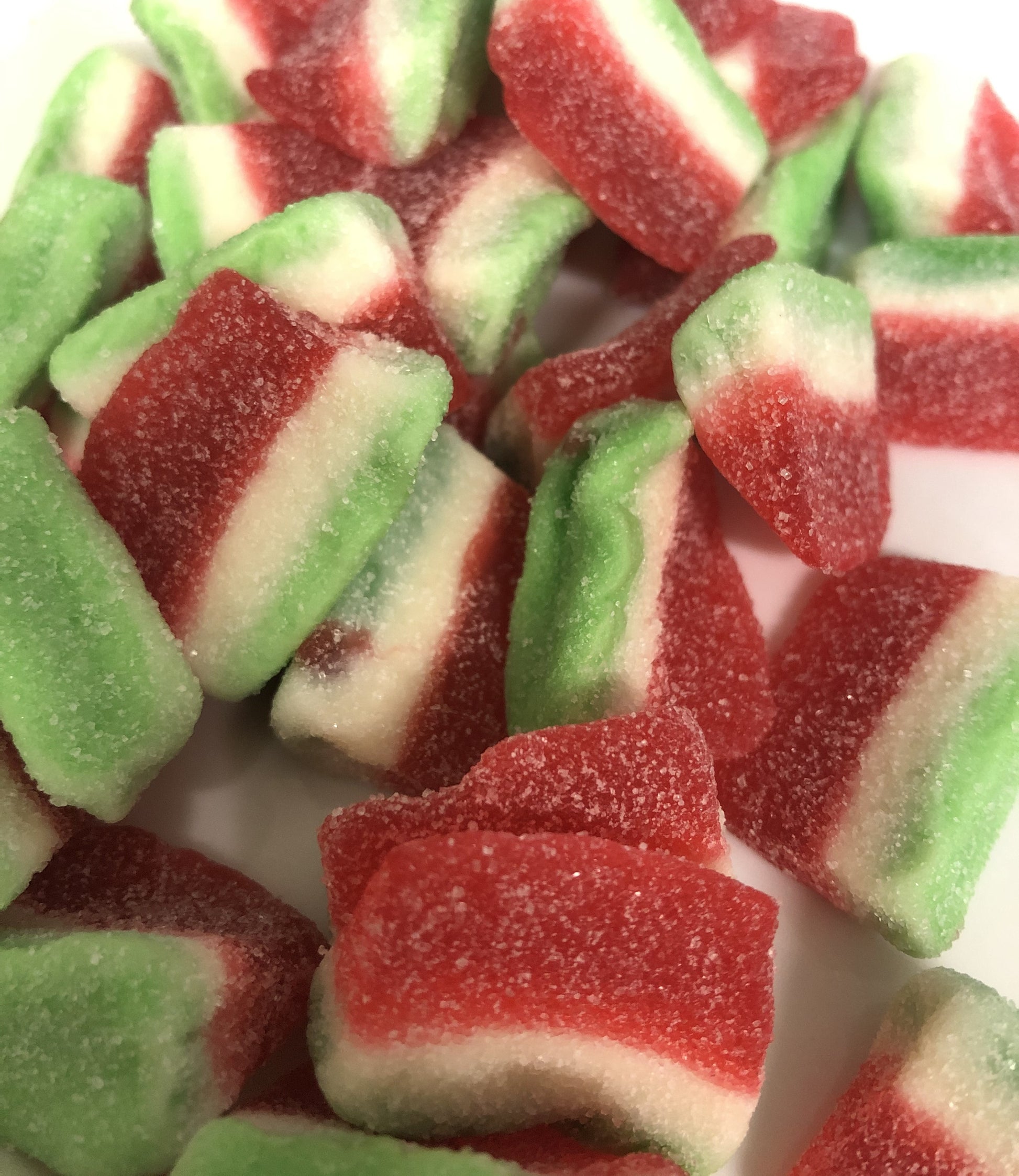 SelectSweets watermelon candy slices with red, white, and green sugary layers close-up