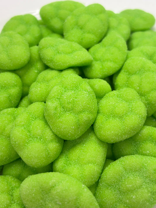 Select Sweets green watermelon gummy candy covered in sugar granules close up